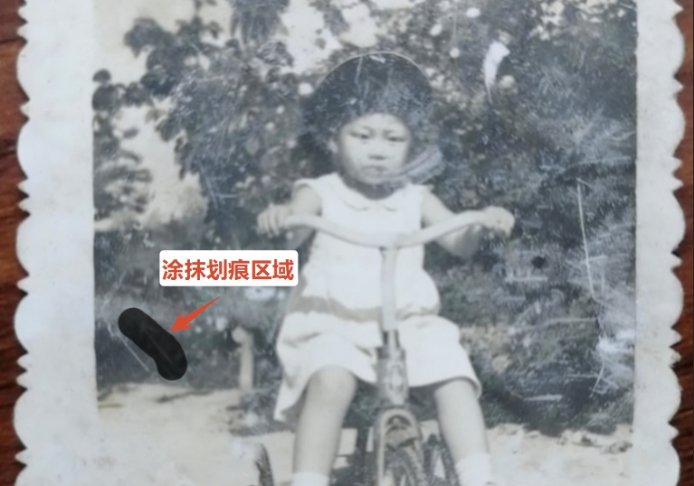 用污点修复画笔工具涂抹划痕区域